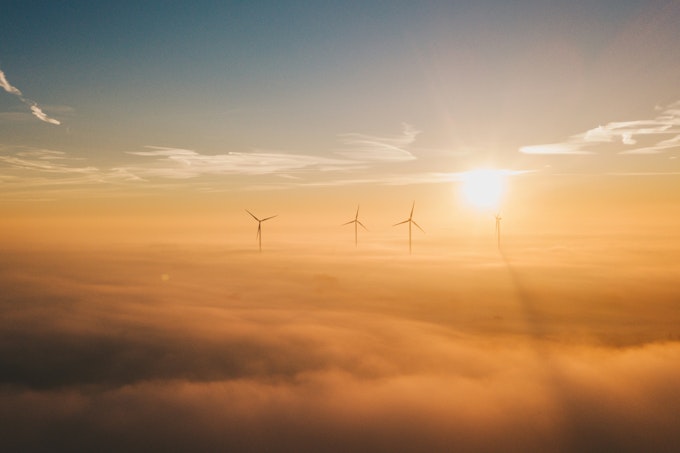 Photo Showing A Group Of Windmills Above Clouds By Sander Weeteling N64qxlfs2qg Unsplash